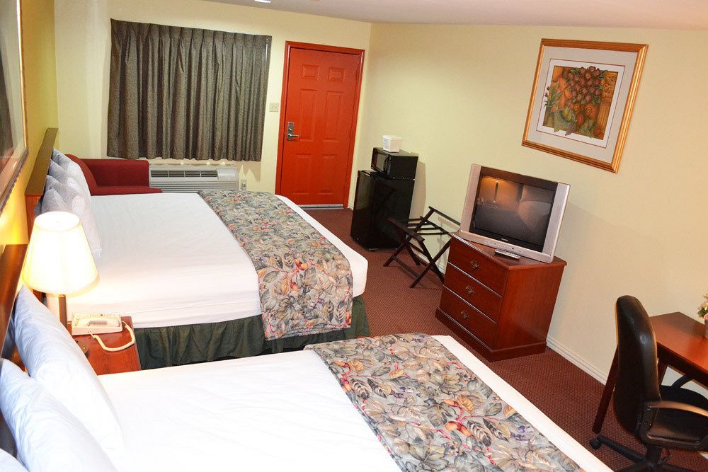 Executive Inn & Suites Magnolia Zewnętrze zdjęcie